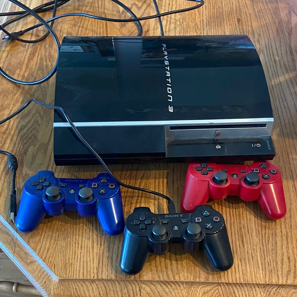 Sony PlayStation 3 Console with Black, Blue & Red Controllers